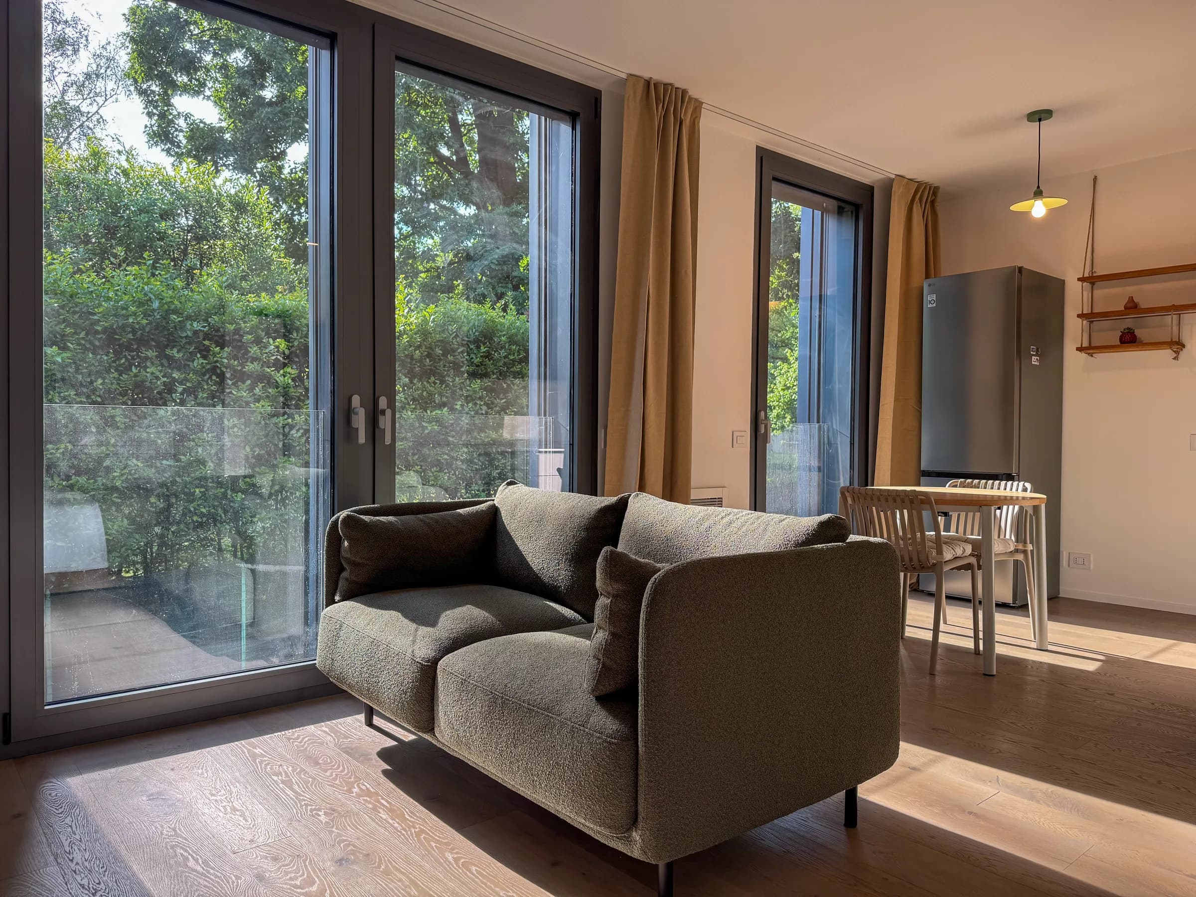 Tea Apartment living room with sofa and natural light